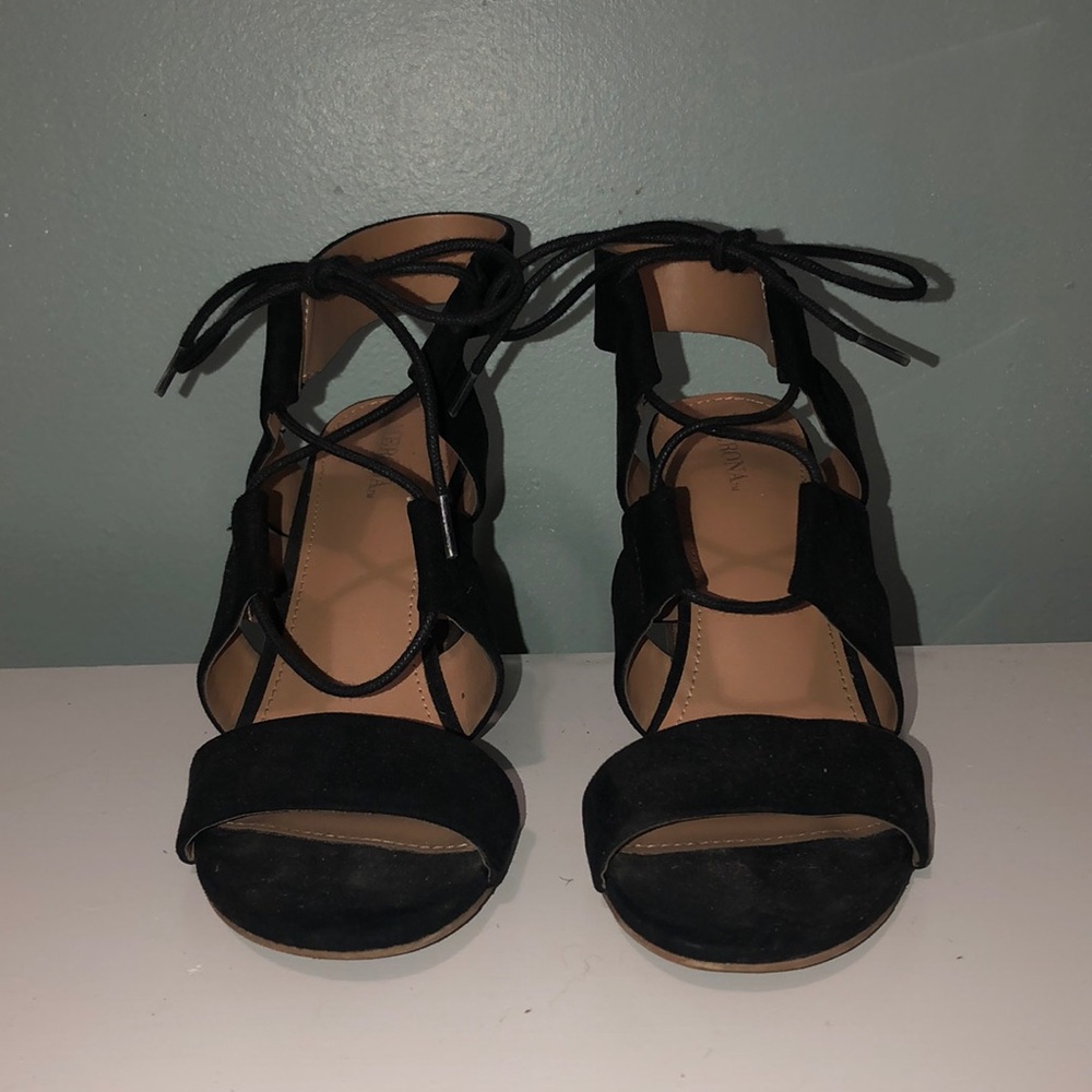 Suede black high heels. Heel is about 3” tall.
